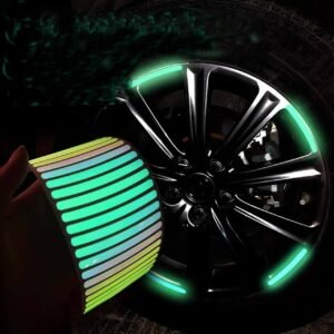 Reflective car wheel stickers glowing green in low light