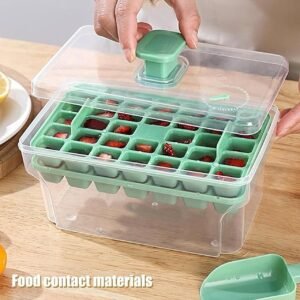 Green plastic ice tray with transparent lid and storage container